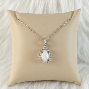 Opal and white sapphire halo solitaire necklace sterling silver